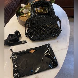 Used only twice beautiful bag. No scratches or tears. Excellent condition.